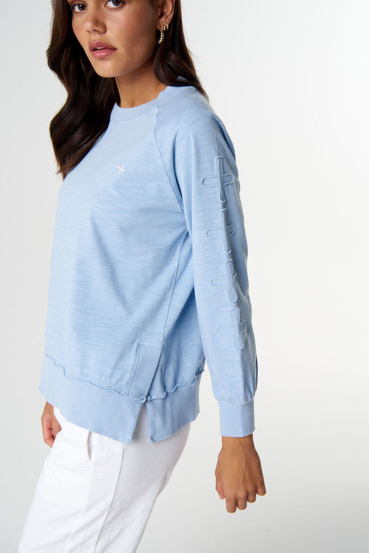 The Fave Cross Sweater